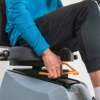 Yellow seat-position adjustment bar beneath the LXT-700 seat.