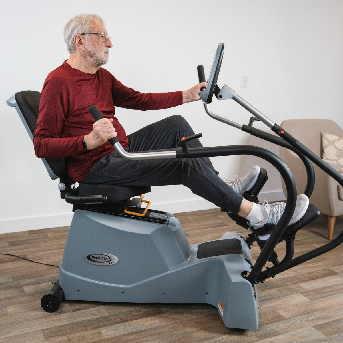 Side view of a man exercising on the LXT-700.