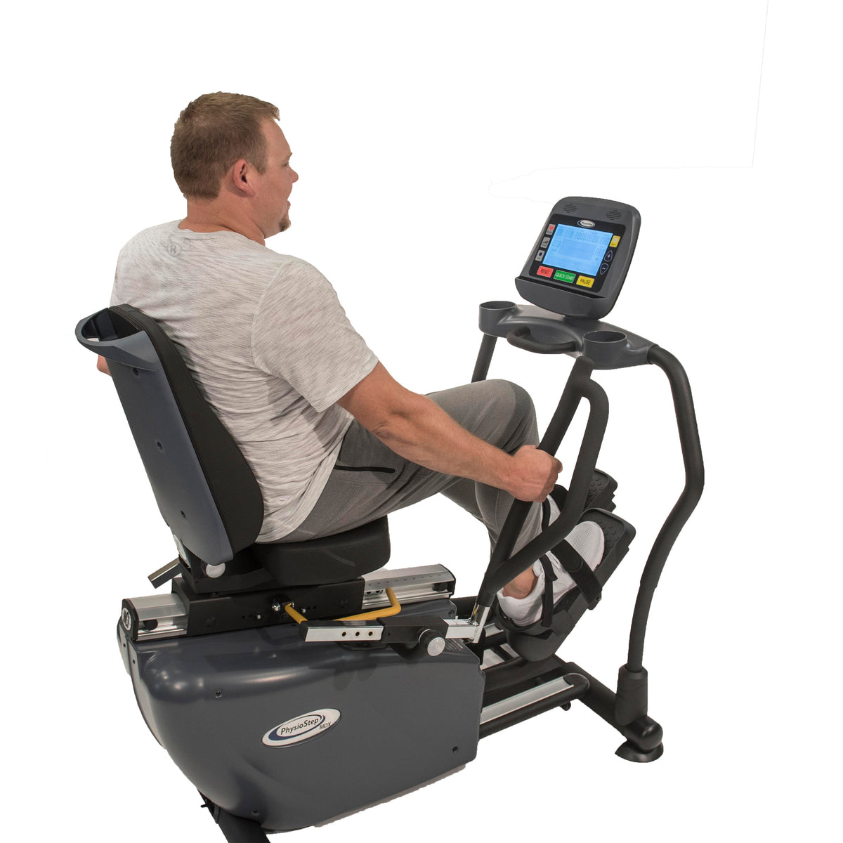 Person using the PhysioStep MDX seated elliptical
