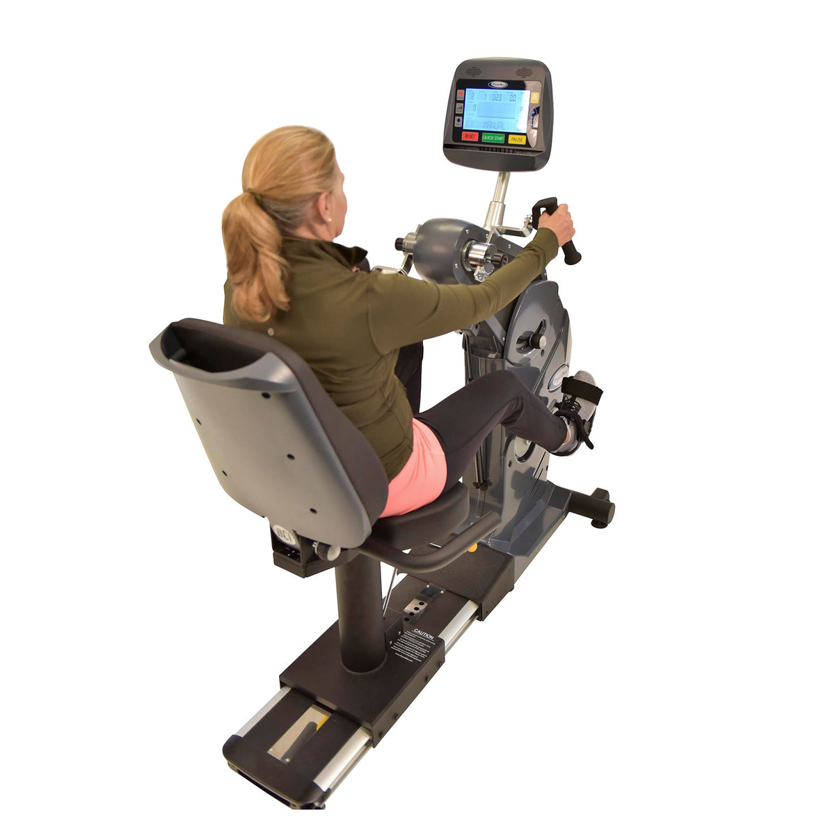 Person using the PhysioMax upper and lower body cranks