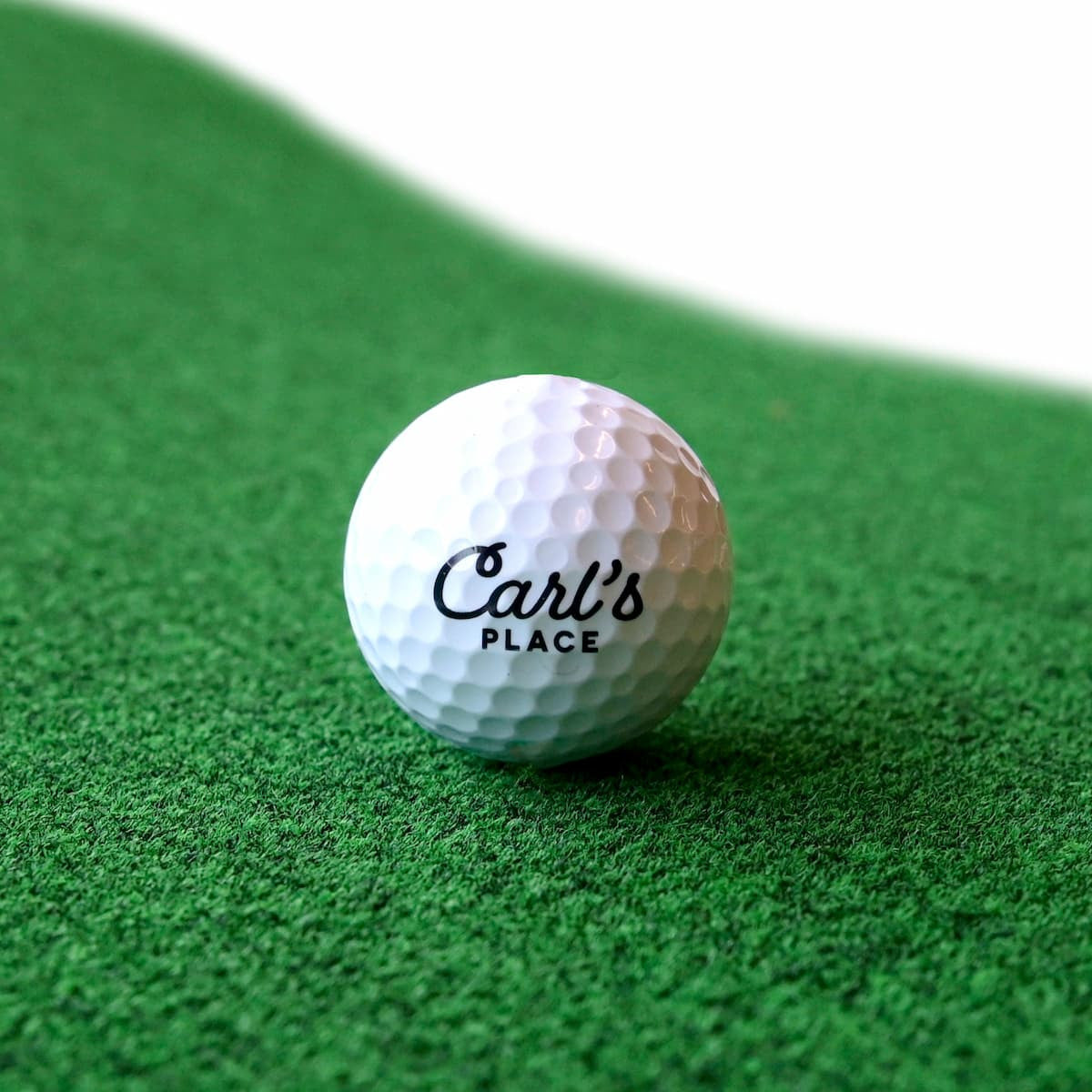 Big Moss Golf Simulator Turf closeup with golf ball