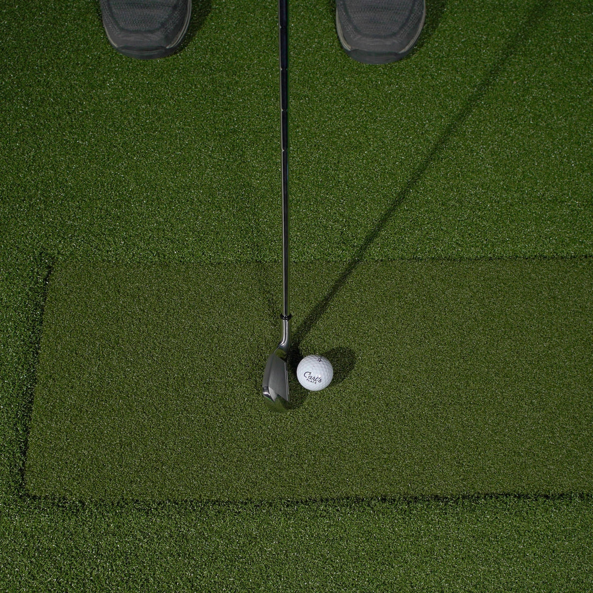 Carl's Place HotShot golf mat with club and ball, overhead view