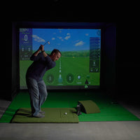 Iron addressing a golf ball on the HotShot hitting surface