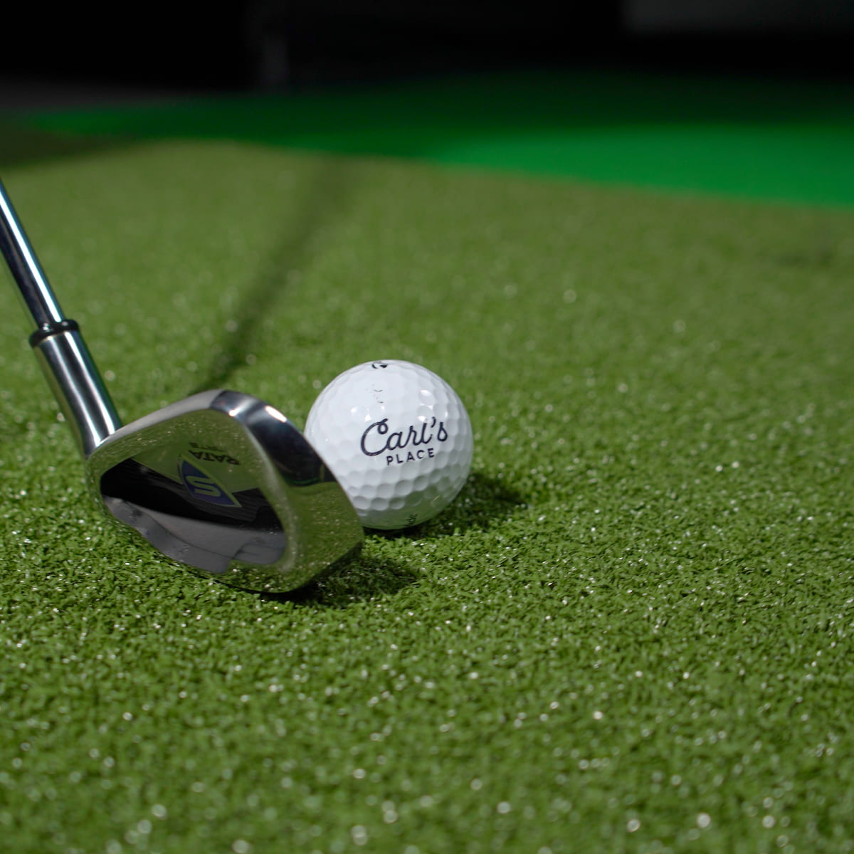 HotShot golf mat rolled and boxed for delivery