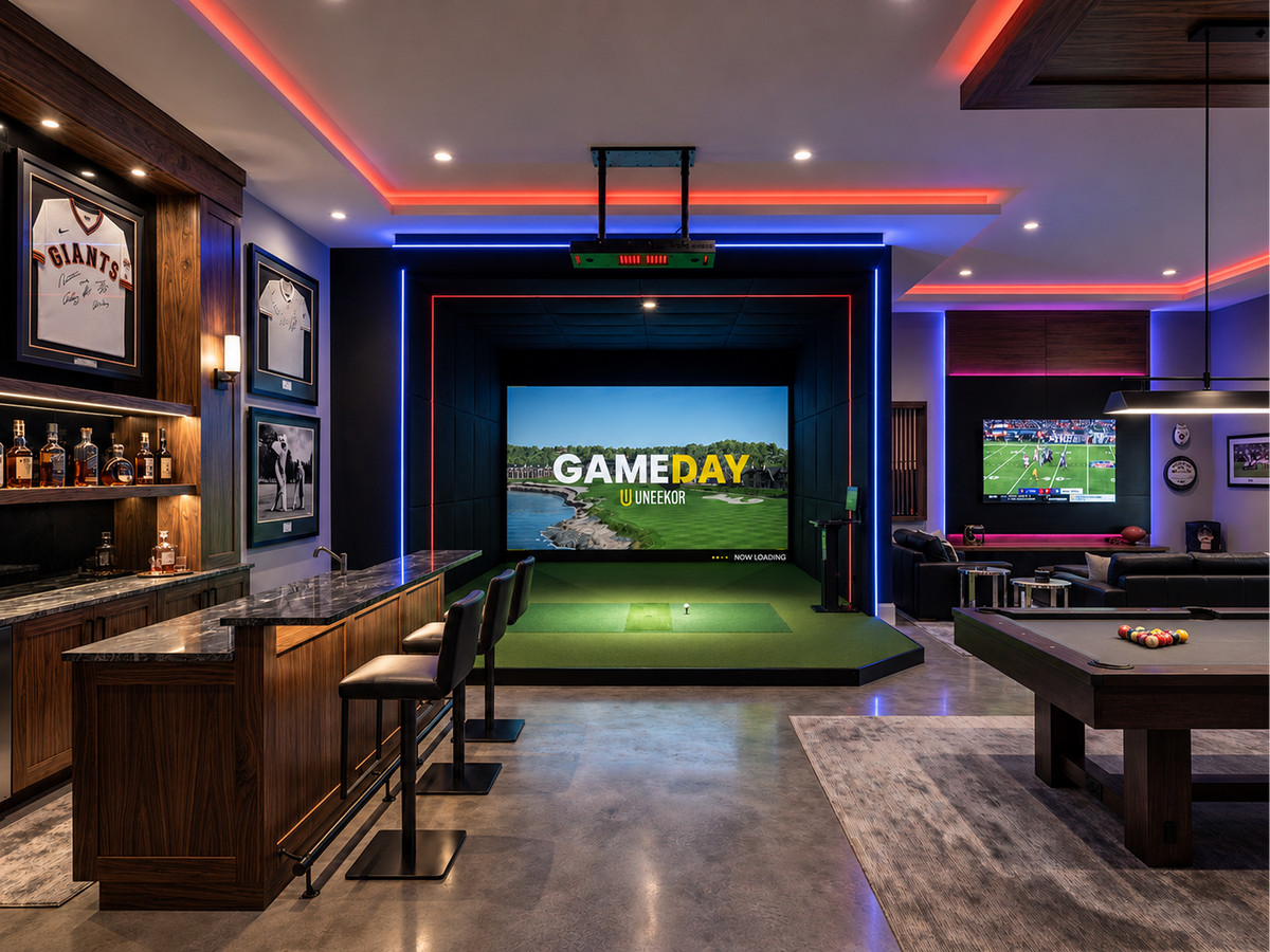 Uneekor EYE XO installed in a dedicated indoor golf simulator room
