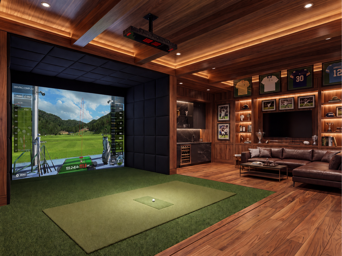 Uneekor EYE XO ceiling-mounted in a home golf simulator room