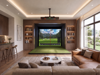 Uneekor EYE XO2 installed in a bright home golf simulator room