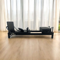 The Core Collab Full Track Queen Studio Pilates Reformer — Black Upholstery Black Frame
