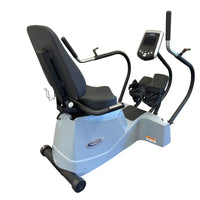 Rear three-quarter view of the LXT-500 seat, console and foot pedals.