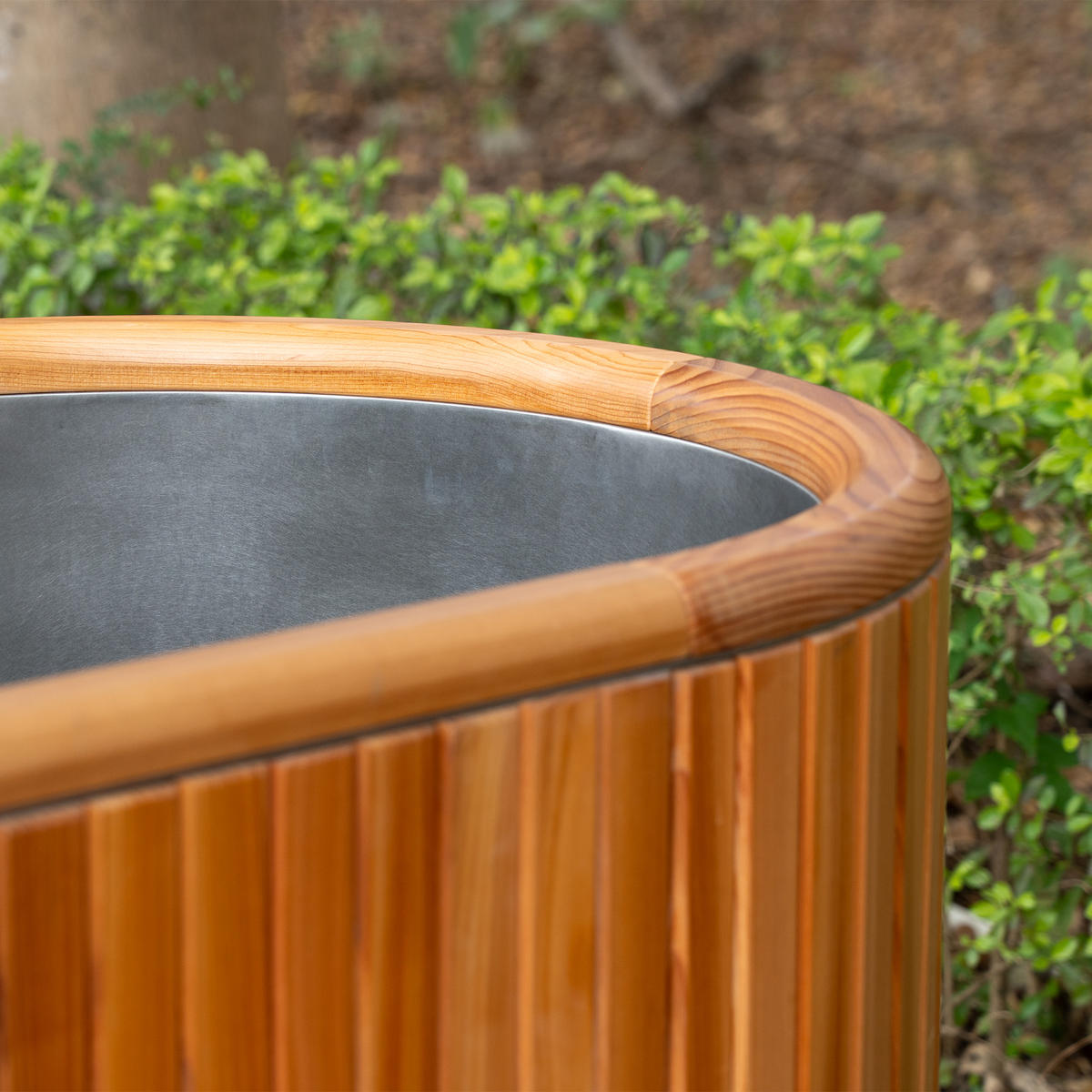 Aurland cedar cold plunge exterior and stainless steel rim detail
