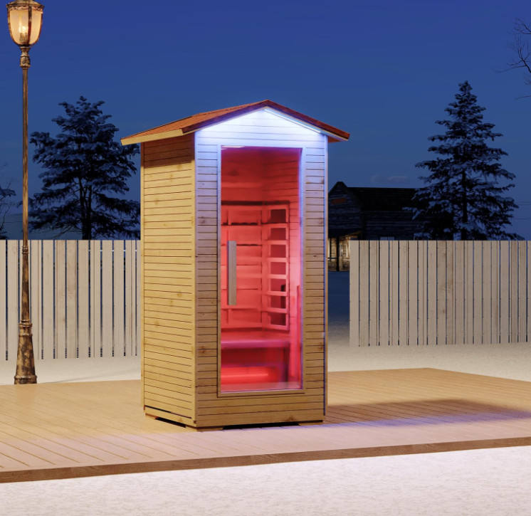 Fjordheim solo outdoor infrared sauna in an evening garden